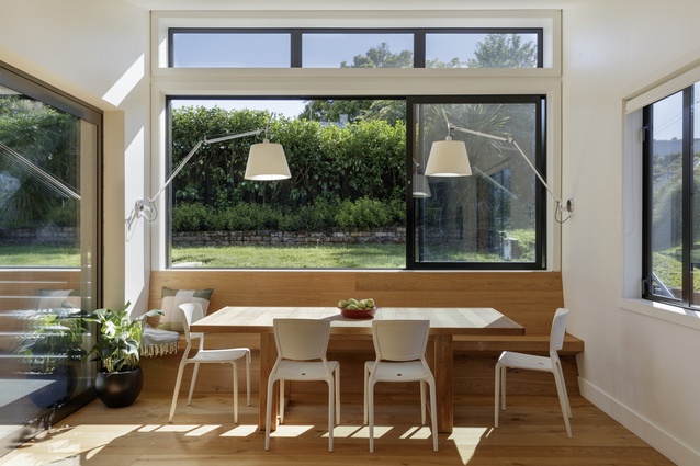 This 2015 Eden Terrace extension connects the house to its raised back garden with rising roof, generous window seat and tall windows that let in the light.