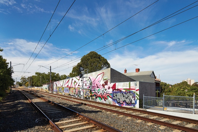 The railway side of the forty-metre block wall was intended to function as a canvas for street art.