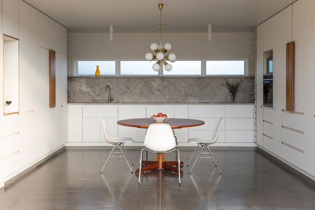 The Luxury of Enough, Beach Haven — the central dining and kitchen portmanteau space.