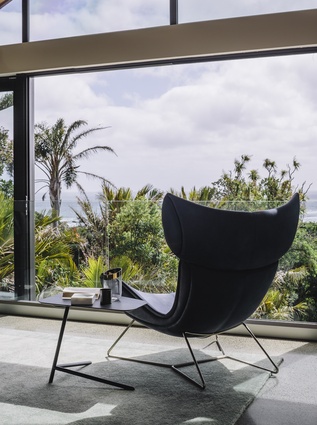 Views of the ocean from the living room. This space is furnishes with the Imola Chair, Laval Side Table, Living Dish. 