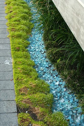 An example of a rainwater swale with sea glass.
