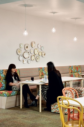 Colourful banquette seating in the café area.