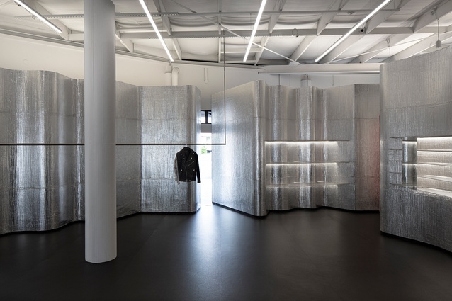 The retail space creates "a white noise and visual static stage for fashion that increases the prominence of products on display", says Tsujimoto.