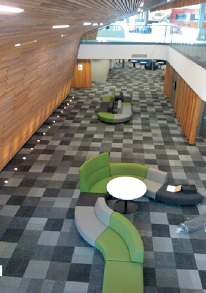 The AUT Sir Paul Reeves building implements task zoning using accoustical support in the furniture. 