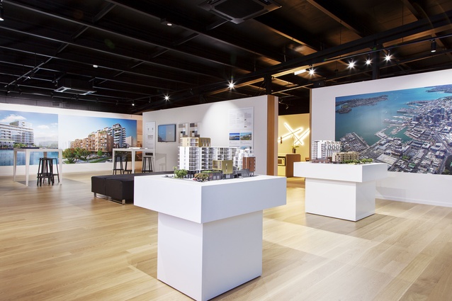 The interior of the display suite includes architectural models of the two buildings, and fully-furnished apartment sections