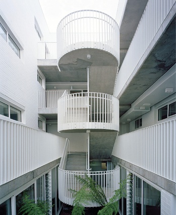 Providing opportunities for chance encounters, the central staircase offers an invitation to be neighbourly.