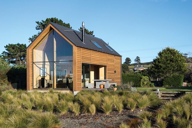 <em>Taieri Bach</em> by Regan Johnston of Mason and Wales won the Residential Architectural Excellence category and was named joint supreme winner at the 2014 NZ Wood Resene Timber Design Awards.
