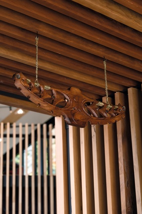 The taonga above the main entrance of Kupe is by renowned iwi artist Bernard Makoare.