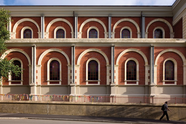 The rhythmic façade of the south elevation faces Hill Street; the concrete columns are part of the strengthening work of the 1980s.