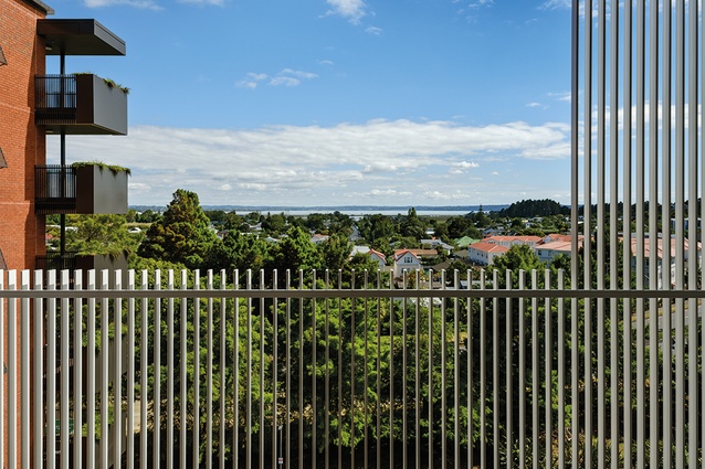 Close attention has been paid to balcony detailing and construction. Balustrading consists of metal vertical flats that sit perpendicular to the balcony edge.