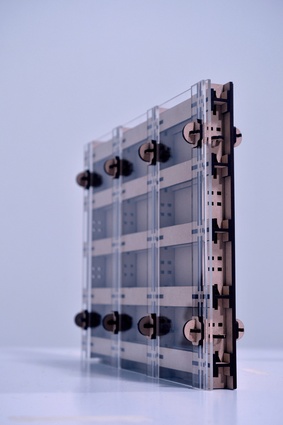 Assembly optimised Click-Lock CNC cut plywood wall (1:20 laser cut MDF model).