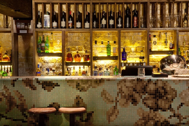 Downstairs bar with '8-bit' bar tiling.