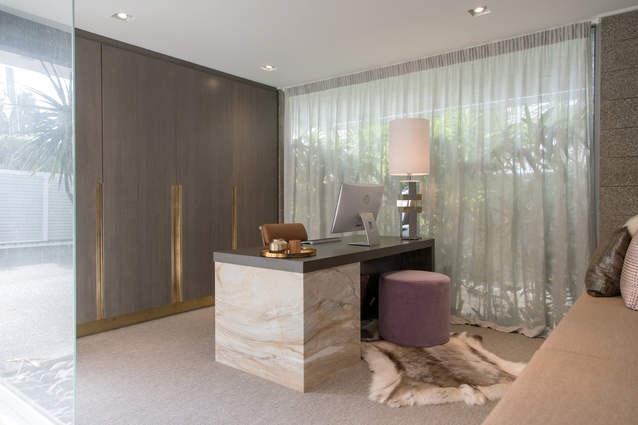 The office features more of a ‘sexy’ feel to the design, with the use of opulent materials such as Italian marble, brass-accented timber veneer doors, reindeer hide and cashmere.
