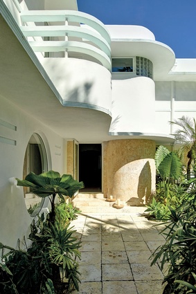 The art deco mansion features many curves and circles as part of its charm.