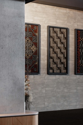 Turapa woven tukutuku panels, created by Ngāti Whakaue kai raranga, adorn the back wall of the foyer.