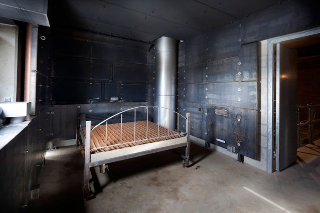 This is not a bed you want to sleep on! Its base can be set on fire at the press of a button, training firefighters to recognise the signs of a dangerous 'flashover' fire.