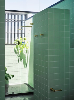 The shower is a glorious, sheltered room contained within a veiled enclosure but open to the elements.

