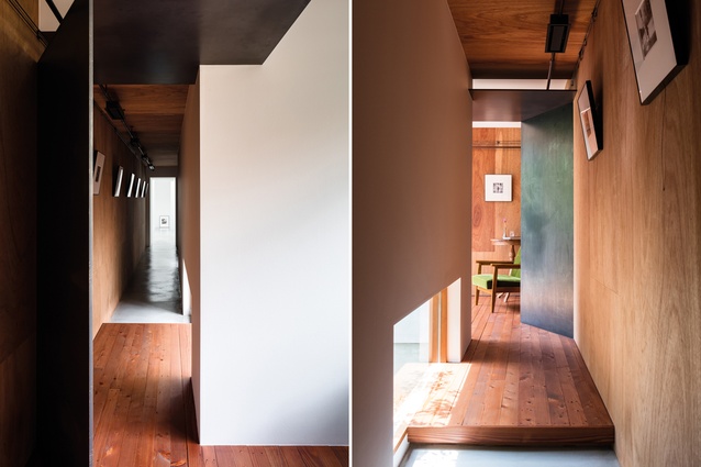 Timber flooring and ply walls bring warmth to the spare material palette and signify the transition to a living zone.