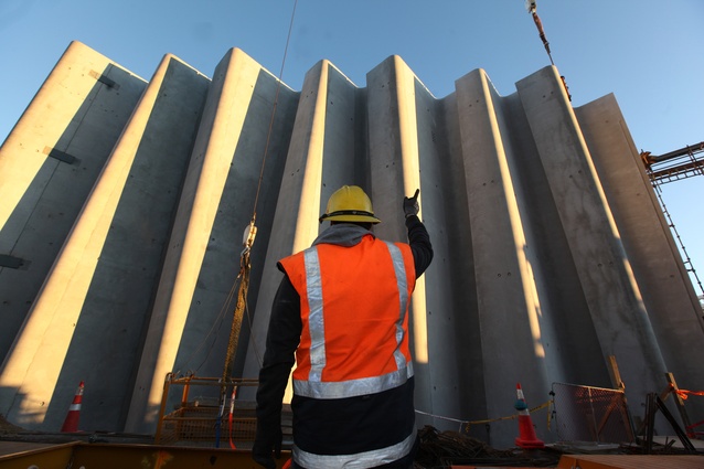 The façade panels are 14 meters high are weigh 35 tonnes each. 