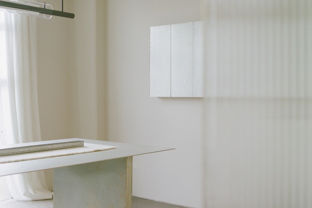 Grounded, earthy materials keep the space from feeling sterile.