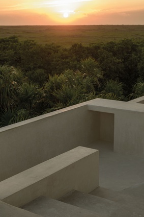 Incredible sunset views over the jungle from the private roof terrace.