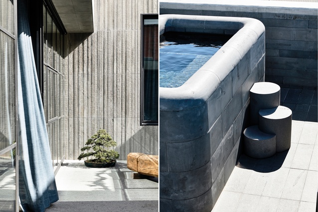 The concrete wall in the courtyard reveals the textured grain of the timber framework; on the rooftop terrace, a sarcophagus-like spa is sculpted from bluestone.