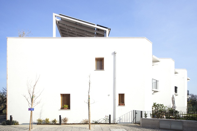 Straw bale townhouses in Fano, Italy by Archética, 2015. 