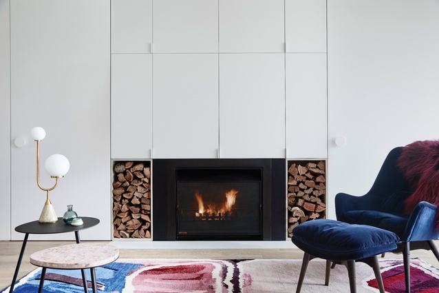 A fireplace and hydronic heating provide warmth in winter, in a house that enjoys minimal temperature fluctuations.