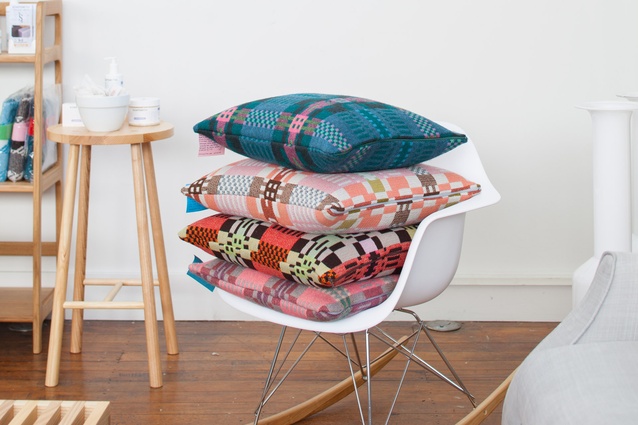 "In these cushions Donna Wilson uses the structure of the weave to create the design, which is a very traditional way of doing it. They are very graphic and colourful."