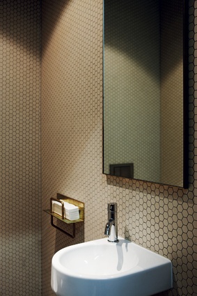 Bathrooms are tastefully restrained in colour palette.