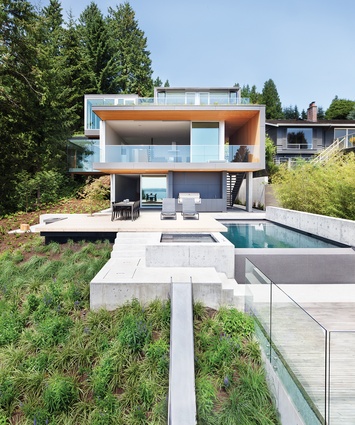 West Vancouver, Canada. The house is positioned high on the site to make the most of its views onto the ocean and forest, along with maximum sunlight.