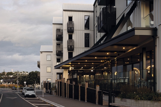 The northern edge locates the hospitality offerings under a large canopy.