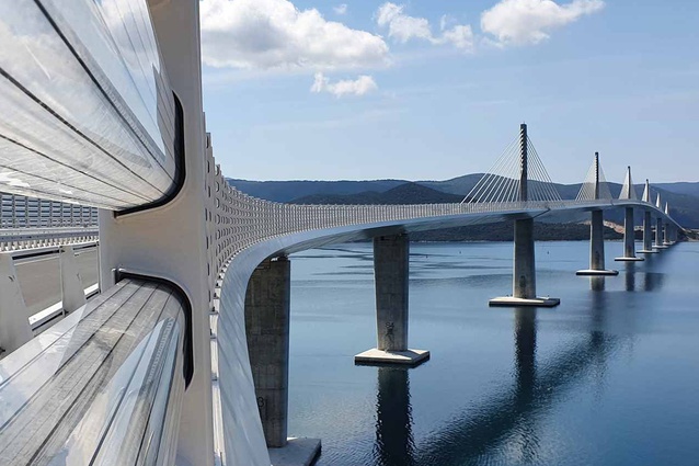 The low-pitched, thin-line bridge would sit on piers reaching about eight metres above the water.