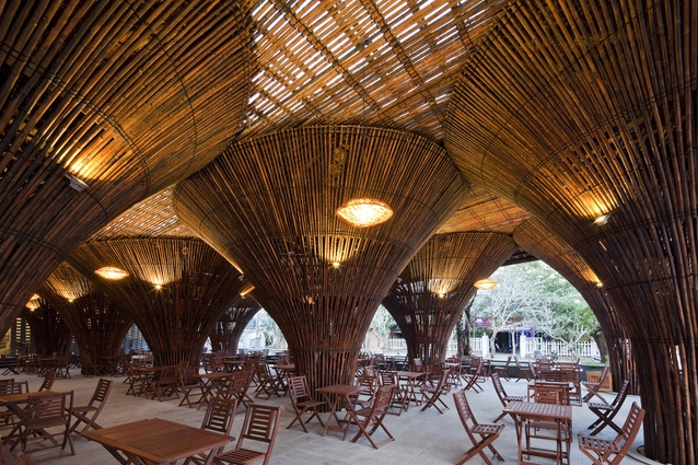 Kontum Indochine café. The 15 inverse cone-shaped columns are inspired by traditional Vietnamese fishing baskets and create the sensation of dining in a bamboo forest.