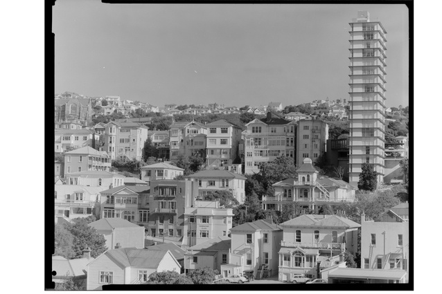 Houses, Te Aro, Wellington, April 1970, black and white negative transferred to digital and printed on adhesive paper. Ref: DW-4219-F. Alexander Turnbull Library, Wellington, New Zealand. 