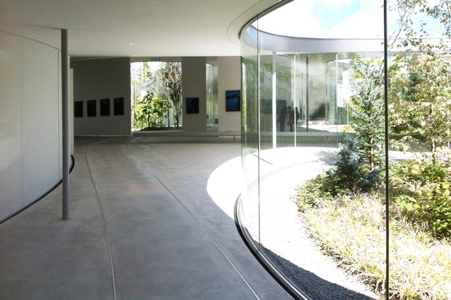 Ryue Nishizawa’s Hiroshi Senju Museum – the gallery floor falls more than three meters down the length of the space.