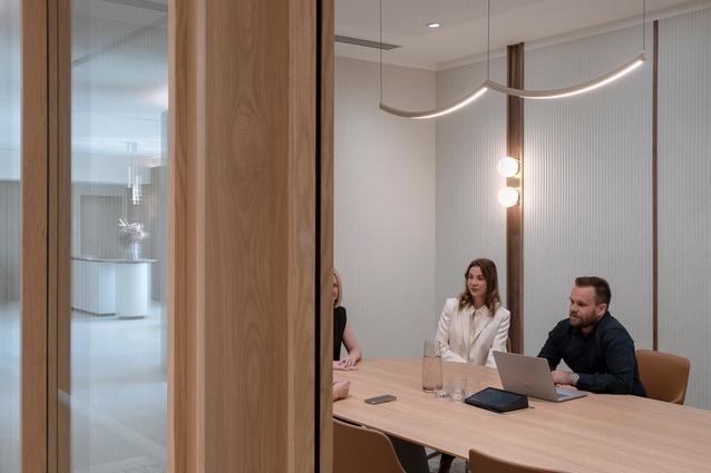 Bespoke lights seen in a meeting room.