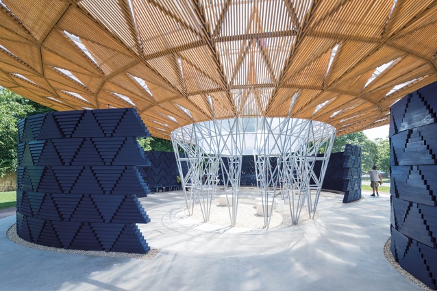 Light filters through the roof, creating movement throughout and connecting visitors with the sky.