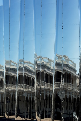 Refections in the stainless steel show the White Hart Hotel (1886), located opposite. 