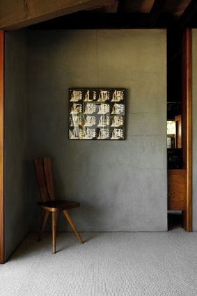 A Carlo Mollino Oak Side Chair designed for the Casa del Sole Apartments sits in the corner of this space.

