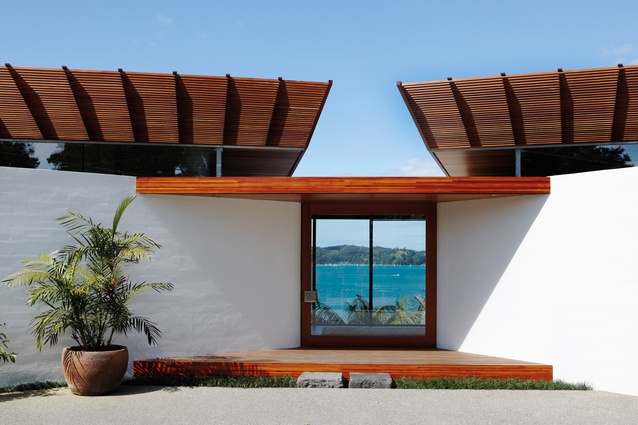 Timber sunscreens echo the sense of ‘taking off’ but, in a practical sense, they filter sunlight that enters high-level clerestory windows and flows into the interior spaces.