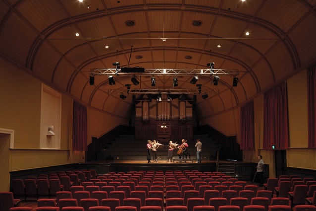 The concert hall is modest in design, keeping to its roots of community use. The seating absorbs sound so acoustic levels are maintained, even with a small audience.